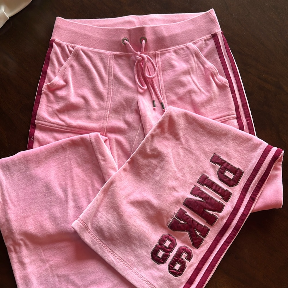 Pink track pants